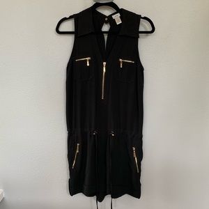 Black romper with pockets and adjustable waist